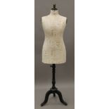 A recovered vintage French dress makers mannequin. 158 cm high.