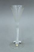 An 18th/19th century air twist stem glass. 19 cm high.