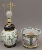 A Chinese porcelain lamp and a Chinese porcelain jardiniere. The latter 15.5 cm high.