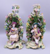 A pair of unmarked Minton arbour form chambersticks,