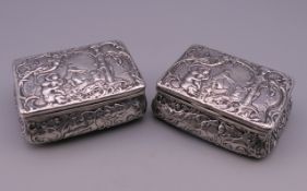 A near pair of 19th century Continental silver table snuff boxes decorated in the Rococo style,