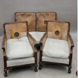 A three-piece bergere suite. The settee 120 cm wide.