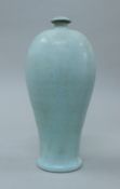 A Chinese egg blue porcelain vase. 31 cm high.