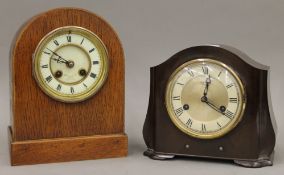 A Victorian oak mantle clock and a Smiths bakelite mantle clock. The former 24 cm high.