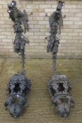 A pair of large dragon form iron wall lanterns. 120 cm high.