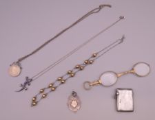 A quantity of miscellaneous jewellery, silver, etc. Vesta 4 cm x 3 cm.