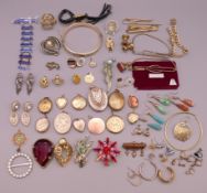 A box of miscellaneous jewellery, including lockets, brooches, earrings etc.
