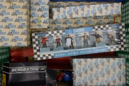 A quantity of Scalextric accessories and buildings, starter, pit crew, owners stand, event board,