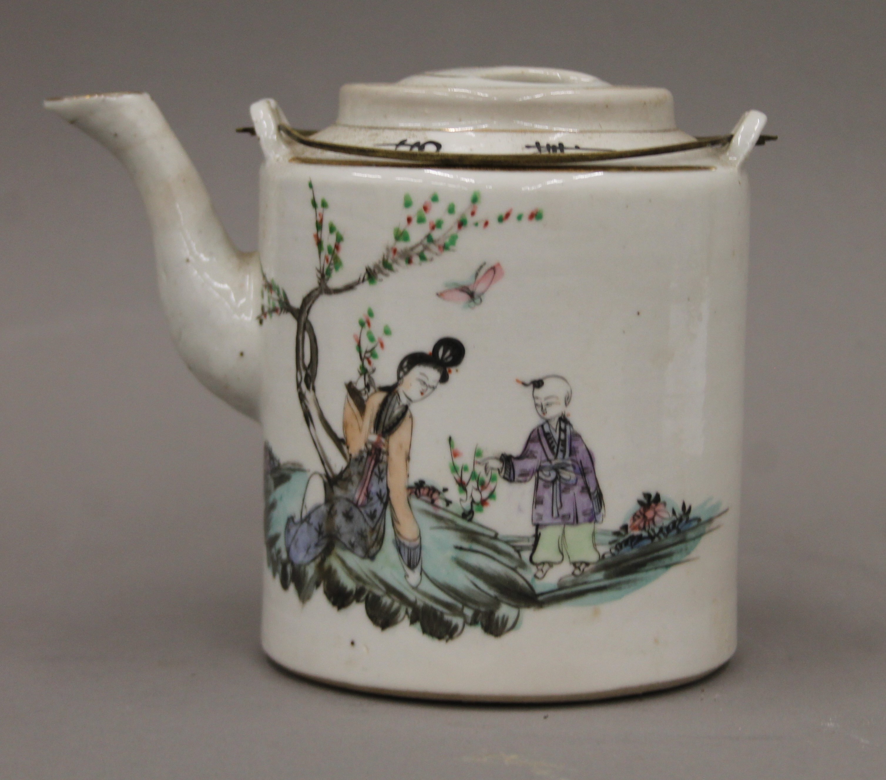 A late 19th/early 20th century Chinese teapot and two tea bowls, housed in a basket. - Image 3 of 11