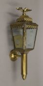 A brass carriage lamp. 44 cm high.