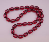 A large bead necklace. Approximately 86 cm long.