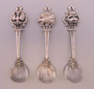 Three 19th century French unmarked white metal salt spoons. Each 6.75 cm long.