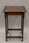 An early 20th century oak barley twist table. 45 cm square.