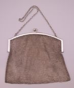 A silver mesh handbag. 16 cm wide, 15.5 cm high. 207.4 grammes.