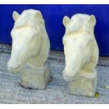 A pair of composition gate post horse head finials. Each 61 cm high.