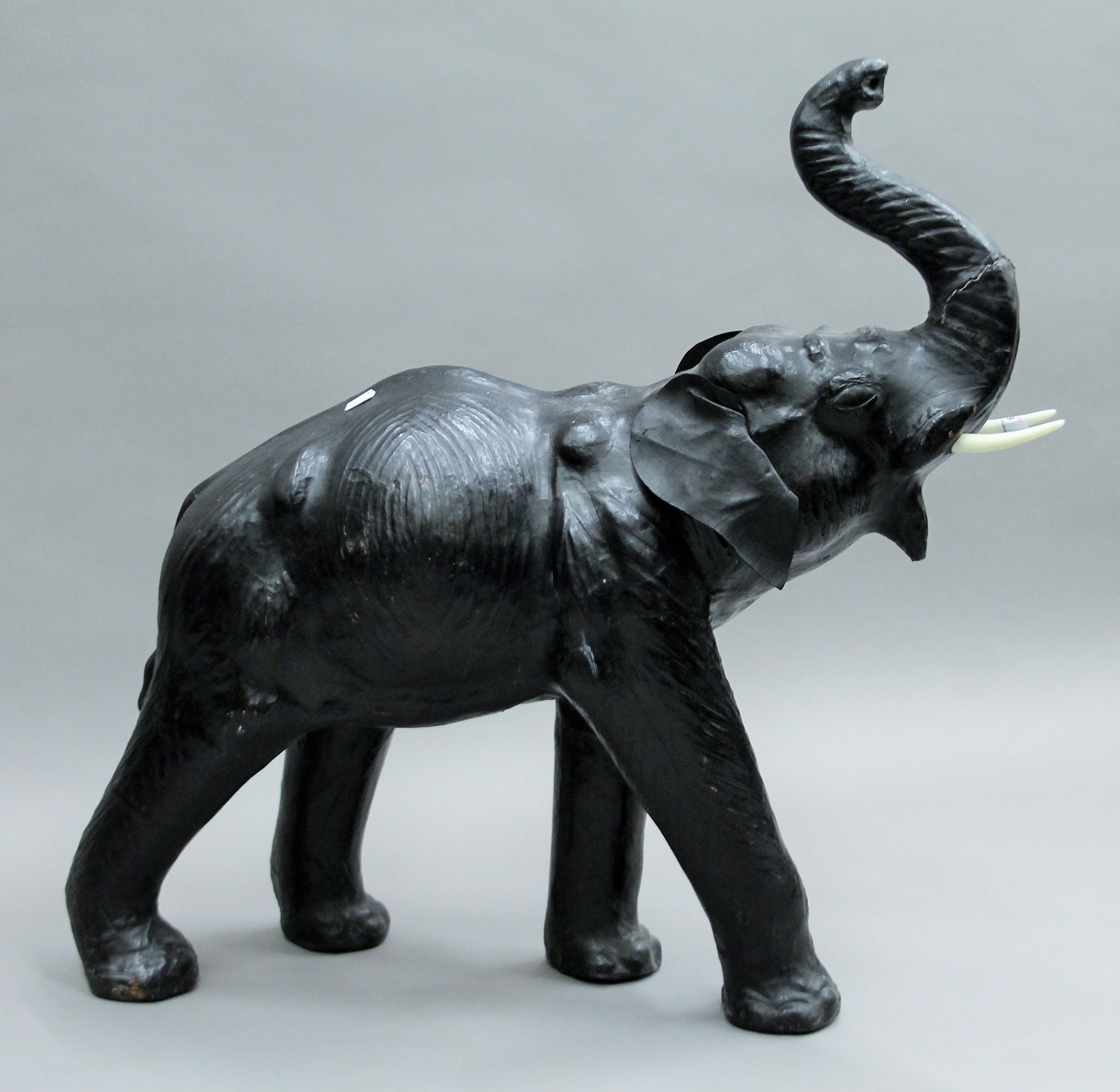 A leather model of an elephant. 75 cm high 30 cm wide 70 cm deep. - Image 3 of 3