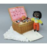 A vintage sewing box, a Mickey Mouse toy, a Golly and a small quantity of linen.