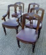 A set of five Victorian oak dining chairs, including one with arms (59 cm wide).