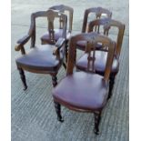 A set of five Victorian oak dining chairs, including one with arms (59 cm wide).