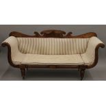 A 19th century upholstered mahogany settee. Approximately 198 cm wide.