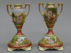 A pair of Vienna porcelain vases. 22 cm high.