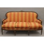 An upholstered Louis XV style settee. 170 cm wide.