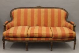 An upholstered Louis XV style settee. 170 cm wide.