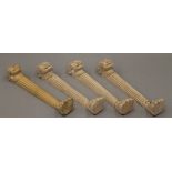 Four carved wooden table legs in the manner of Thomas Hope. 57.5 cm high.