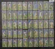 Three sets of John Players cigarette cards depicting cricketers and footballers,