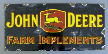 An enamel John Deere sign. 45 cm wide.