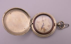 A silver plated WWI period full hunter compass. 4.5 cm diameter.