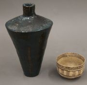 A Chinese pottery vase and a bowl. The former 22.5 cm high.