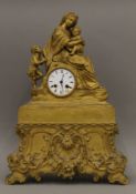 A 19th century gilt bronze and brass mantle clock. 57 cm high.