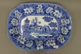 A 19th century Rogers blue and white porcelain meat plate. 51 cm long.