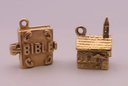 Two 9 ct gold charms, in the form of a church and a bible. Each 1.5 cm high.