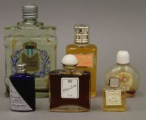 A small collection of perfume bottles.