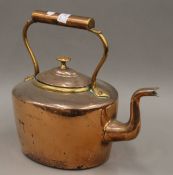 A Victorian copper kettle. 30 cm high.