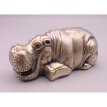 A silver model of a hippopotamus bearing Russian marks. 8 cm long. 76.7 grammes total weight.
