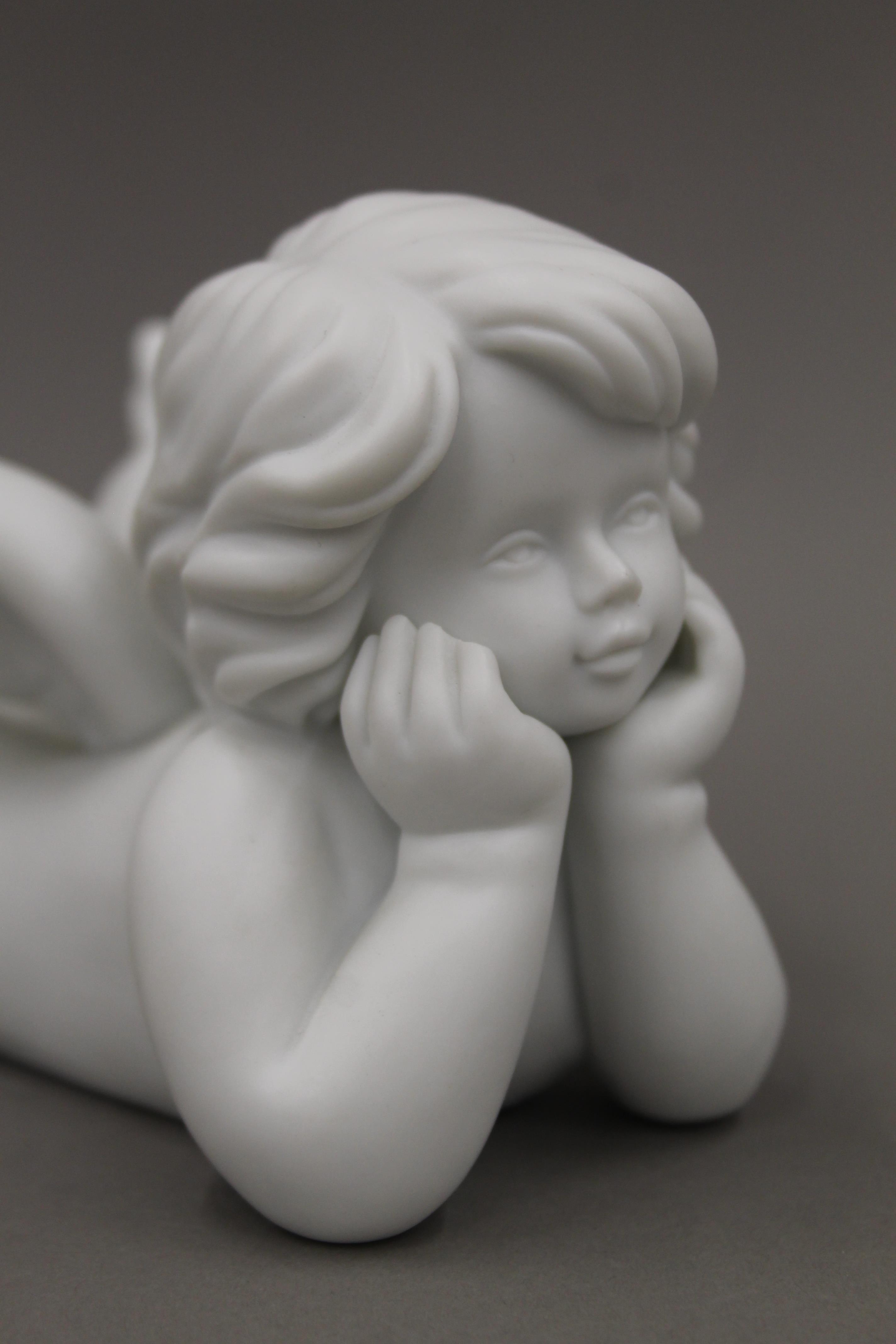 A Rosenthal bisque model of a cherub. 17 cm long. - Image 2 of 4