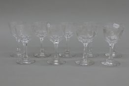 A set of nine 19th/20th century etched wine glasses. Each 12.5 cm high.