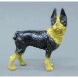 A cast iron model of a pug dog. 20 cm high.