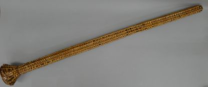 A mail coach copper horn London to Dover, with wicker case. 127 cm long.