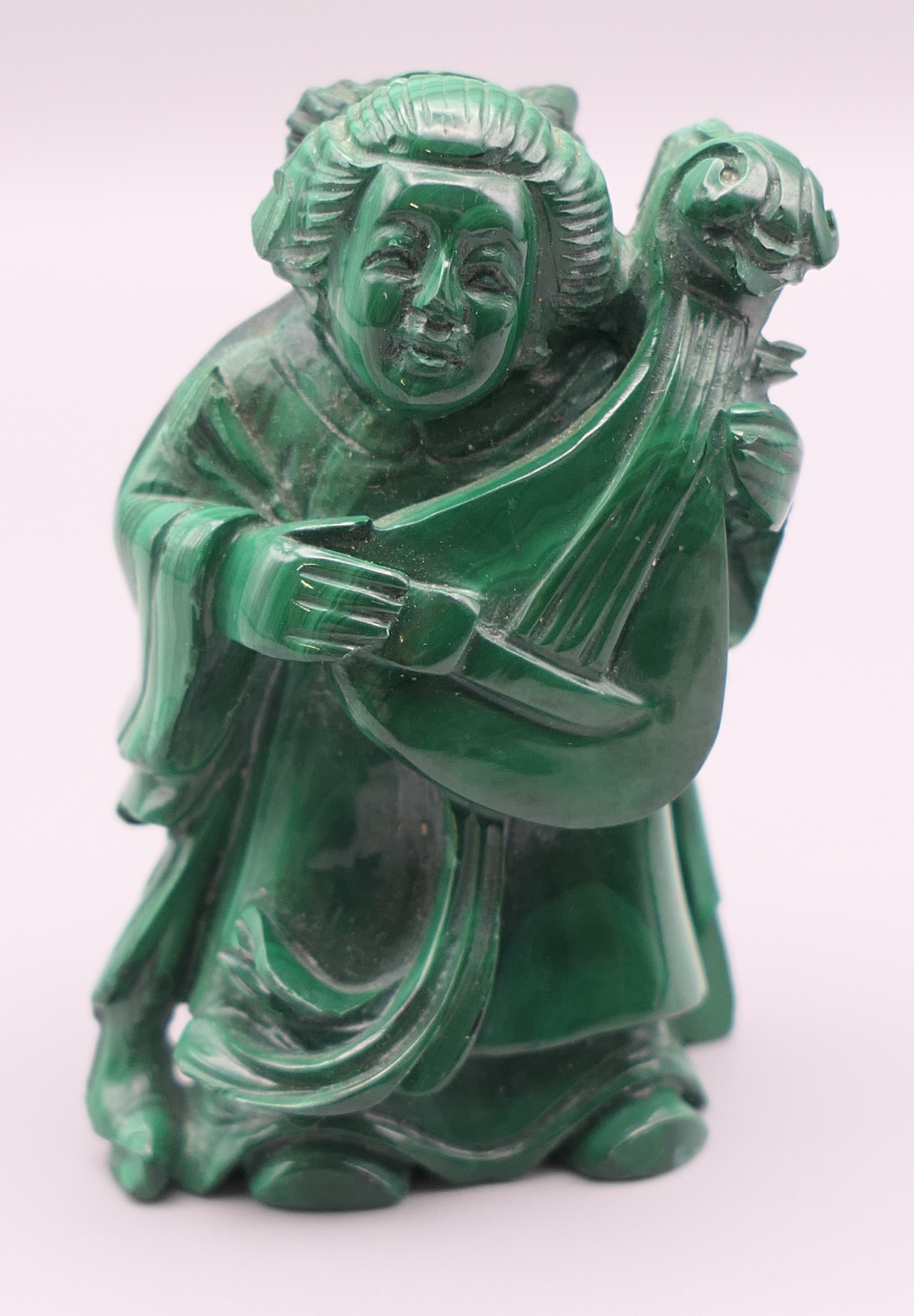 A Chinese malachite figure. 6.5 cm high.