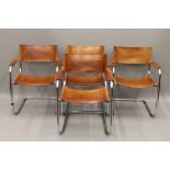 A set of four Matteo Grassi Italian Bauhaus MG5 style steel and tan leather cantilever chairs.