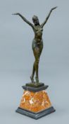 An Art Deco style bronze model of a dancing girl. 55 cm high.