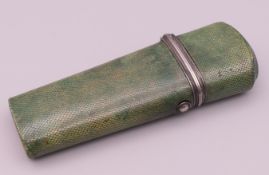 A shagreen etui case containing a penknife and a pencil. 10 cm high.
