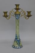 An early William Moorcroft pottery and brass Florian Ware candelabra, signed 'W Moorcroft,