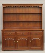 A modern fruitwood dresser. 171 cm wide.