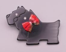 A Lea Stein style scotty dog brooch. 7.5 cm wide.