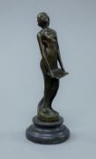 A bronze model of a singing girl. 19 cm high.